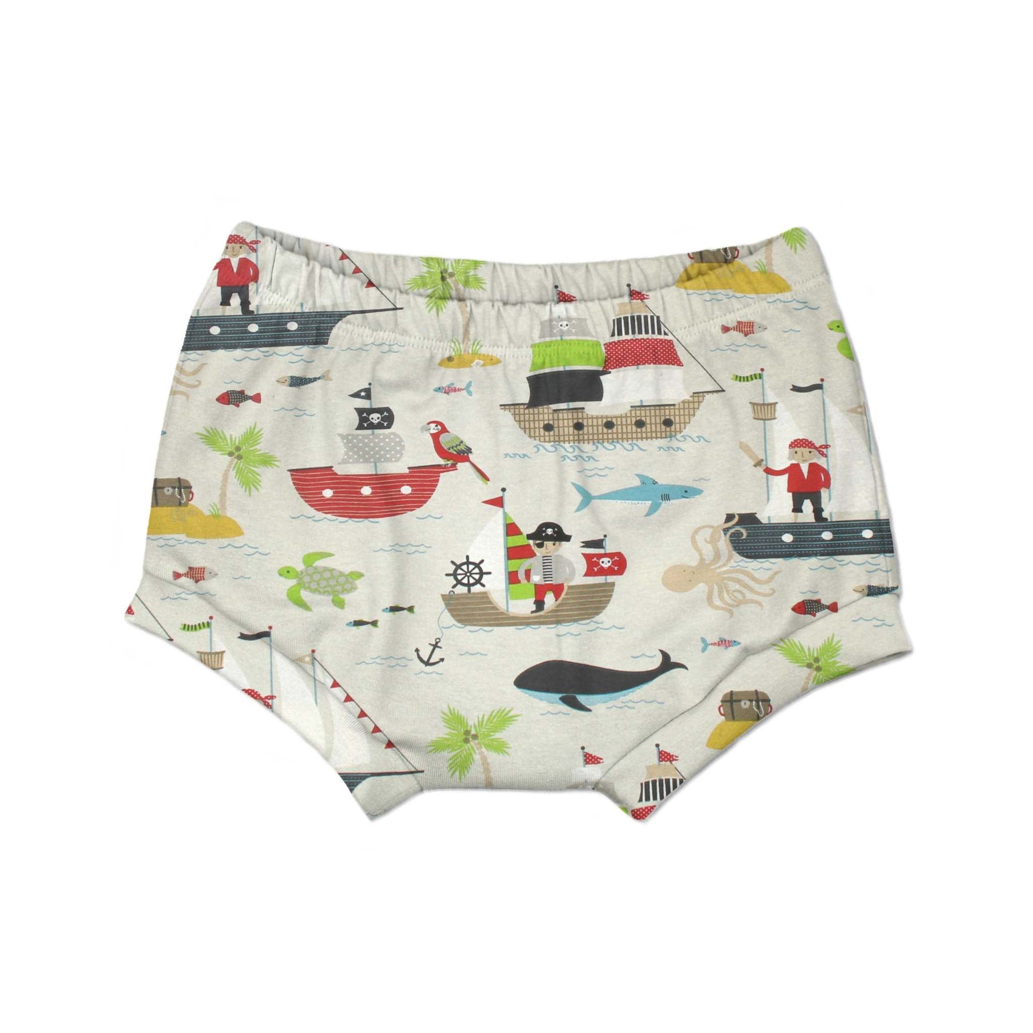 Bummi "Piraten beige" für Babys und Kinder. Auf dem beigefarbenem Hintergrund befindet sich ein buntes Muster mit Piratenboten, Schildkröten, Fischen und Inseln.